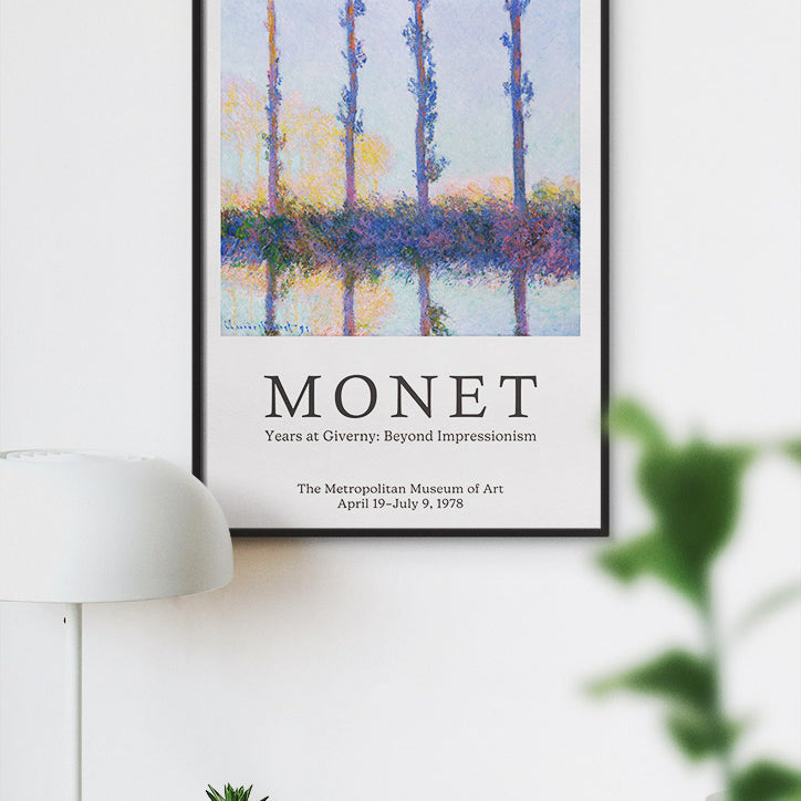 Claude Monet exhibition poster featuring his landscape painting 'The Four Trees' from 1891.