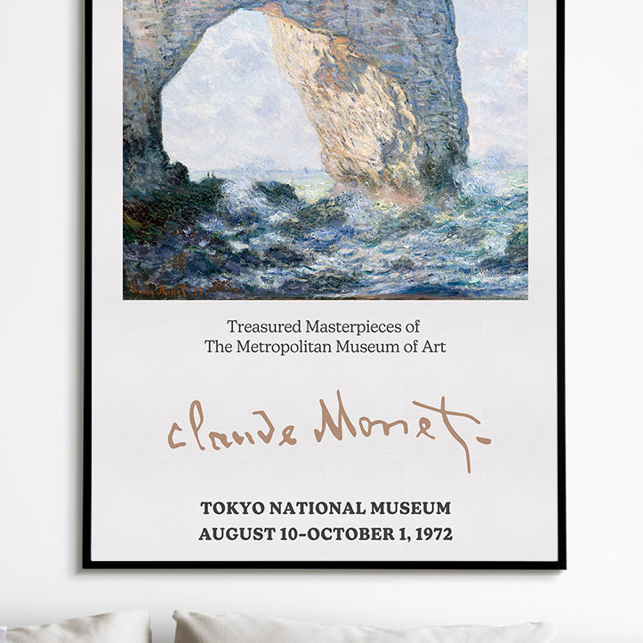 Claude Monet exhibition poster showing his signature and one of his masterpieces titled 'The Manneporte near Étretat'.